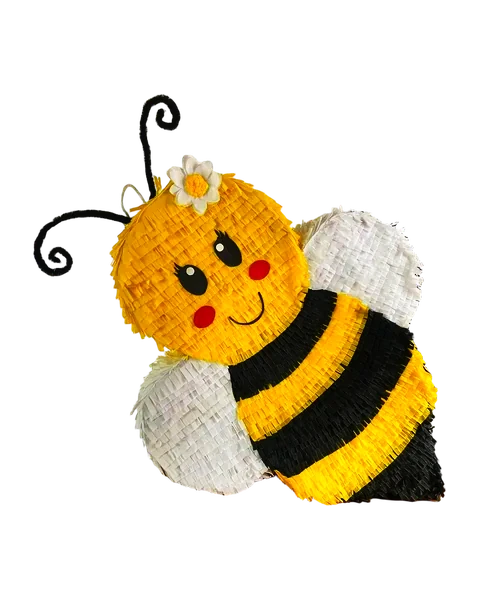 Piñata de abeja: cara amarilla con flor blanca, rayas negras y alas de flecos blancos, recortada sobre fondo liso.